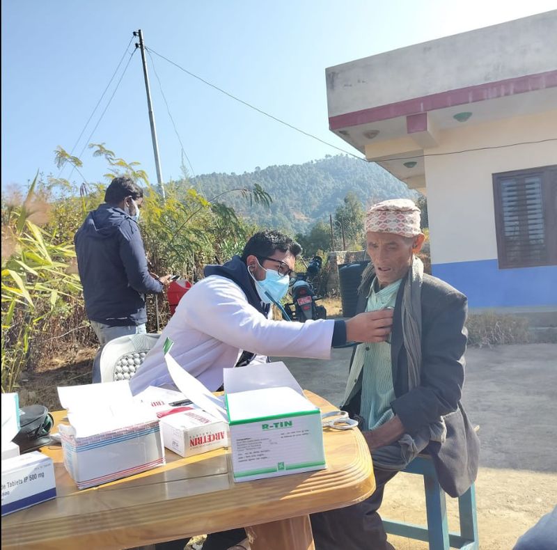 doctor treating patient