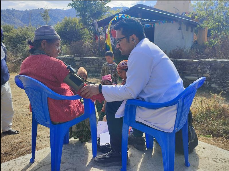 doctor treating patient