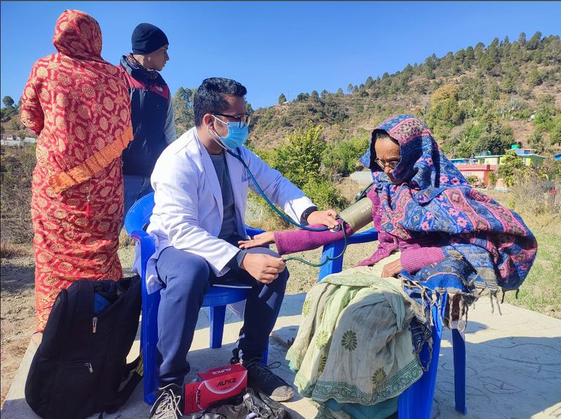 doctor treating patient