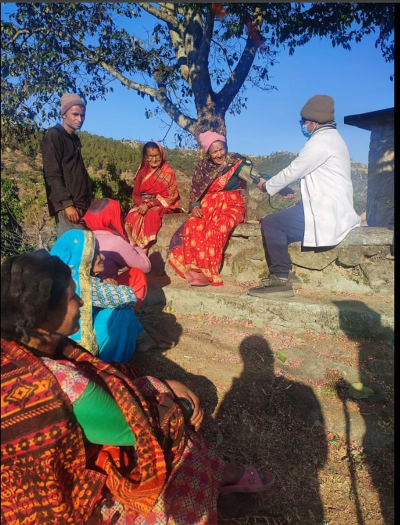 doctor treating patient